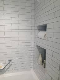 A discrete grout will define the shape of the tiles without being overpowering. White Kitchen Backsplash With Gray Grout Novocom Top