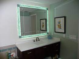 For most projects, a vanity, which includes both the counter and cabinet, is used. Clearwater Beach Florida Master Bathroom Vanities Side Lit Glass Tile Mirror Border Installatio Lighted Bathroom Mirror Framed Bathroom Mirror Bathroom Mirror