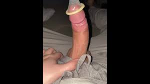 Flooding a Condom with Cum.