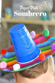 Depending on how big you want the brim of the hat to be, measure a circle with same center having a radius two inches larger than the one you just traced. Make A Paper Plate Sombrero For A Cinco De Mayo Craft Easy And Fun With Video Kid Friendly Things To Do