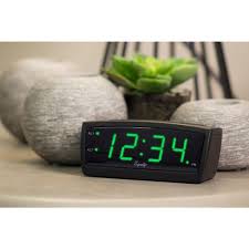 Intended to mimic the sensation of rising with the sun the clock itself is sleekly designed and cool to the touch, so it's safe to use around kids. Equity By La Crosse Green Led 0 9 In Digital Alarm Clock 30229 The Home Depot