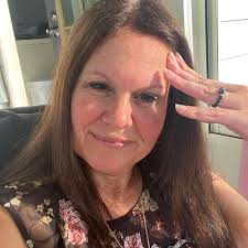 Who were the two people collecting gifts for seniors at the manor?