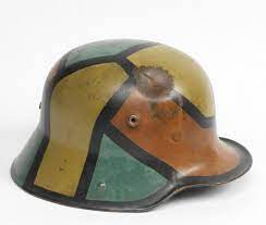 The German Helmet Pictured Here Issued From 1917 To Many Artillery Crew Or Elite Stormtroopers Is Painted In A Disruptive Helmet Camouflage Dazzle Camouflage