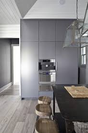 Stunning floor to ceiling utility shaker cabinets organize. Modern Gray Kitchen Cabinets Modern Kitchen Heather A Wilson Architect