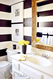 Black And White Striped Wall Decor Summer Home Black Vase Gold Mirror And Yellow Towels From Homegoods Make This Bathroom Look Like Summer Gold Bathroom Decor Yellow Bathrooms Bathroom Decor