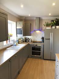 B Q Carisbrook Taupe Kitchen Wicks Windsor Handles And Subway Tiles Taupe Kitchen B Q Kitchens Kitchen Design