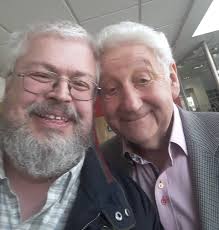 Another selfie, with a parrotfaced childhood hero.