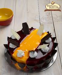 Birthday Cake Ribbons And Balloons Cake Images Enjoy The Special Raspberry Mango Cake With Ribbons And Balloons Raspberryday 31stjuly Raspberrymango Deliciouscomb Online Cake Delivery Cake Cake Delivery