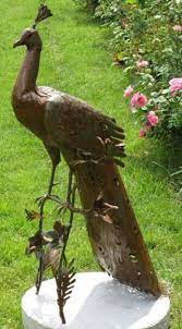 A garden doesn't have to be shabby and plain. Casa Padrino Garden Decoration Sculpture Peacock Rust 50 X 75 X H 118 Cm Elegant Garden Decoration Figure Weatherproof Garden Figure