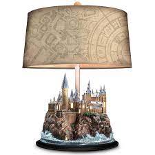 This exclusive collectible hogwarts™ castle table lamp from the bradford exchange features a handsome barrel shade in a neutral tone tops your harry potter table lamp. Harry Potter Illuminated Hogwarts Castle Lamp
