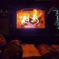 Place the newspaper balls into the center of the firebox. How To Start A Fire In A Wood Stove