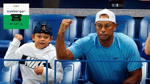 Tiger woods reportedly carried charlie's clubs and stood by as the boy showed off his swing during a junior golf tournament in florida. As Tiger Woods Raises A Son In Golf Might It Help Tiger S Own Game