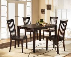 Table is made of veneers, wood and engineered wood; Ashley Coviar Brown Dining Room Table Set 6 Cn On Sale At Furniture And Mattress Warehouse Serving Holland Mi