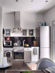 The idea may be the entrance, kitchen, and bedroom are all painted in complementary colors, creating a visual. Kitchen Small Apartment Interior Small Apartment Kitchen Small Apartment Design