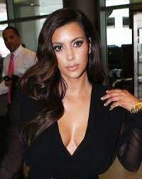 Kim Kardashian Deep Side Part Glossy Barrel Curls Put To The Side Curls For Long Hair Side Part Hairstyles Long Hair Styles