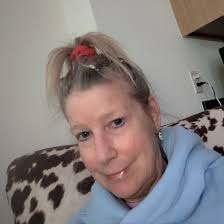 What causes mid lower back pain during recovery from shoulder surgery?