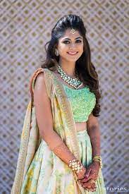 30 Gorgeous Hairstyles Perfect For Your Roka Wedmegood Lehenga Hairstyles Indian Hairstyles Indian Bride Hairstyle
