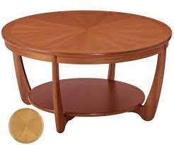 I can fit two wicker baskets underneath for cute added storage. Nathan Shades Teak 5924 Sunburst Round Coffee Table Coffee Tables Rg Cole Furniture Limited
