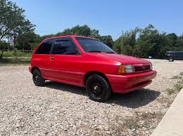 Image result for Blaze Red 1993 Kia