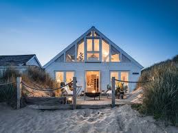 The Barefoot Beach House In Camber Sands Step Right From The Deck On To The Beach From This Large Hol In 2020 Luxury Beach House Dream Beach Houses Beach House Design