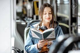 If you want to go for a minimalistic approach in presenting your book cover, this book mockup is all you need. Young Woman Reading Book While Moving In The Modern Tram Happy Passenger At The Public Transport Stock Photo Picture And Royalty Free Image Image 122705559