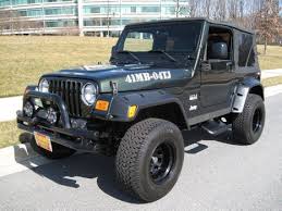 Image result for Brilliant Black 2004 Jeep