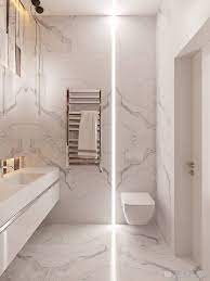 Dramatic cassiopea marble covered walls and floor take your eyes on a gorgeous adventure in this richard mishaan designed home. Luxurybathtiles White Marble Bathrooms Bathroom Design Luxury Modern Bathroom Design