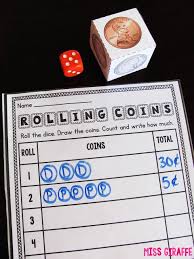 The game is played using a giant spinning hourglass that holds the dice. Teaching Money Money Math Teaching Money Money Games For Kids