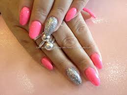 Pink and white acrylic nail manicure is a classic and popular nail look. Bright Pink And Silver Acrylic Nails Nail And Manicure Trends
