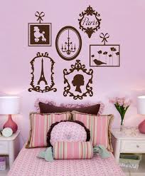 Feminine paris themed bedroom is clad in black and white paris wallpaper lit by a crystal chandelier finished with pink shades and hung over a cream herringbone rug. Pin On Phoebe S Room Redo