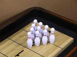 It is played on an outdoor court measuring 52 feet long by 10 feet wide, although there are different dimensions available on new portable and indoor courts. Play Shuffleboard Bowling Alley New Shuffleboard Table Bowling Pin Pin Setter Sporting Goods Shuffleboard