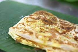 Roti Canai Pronunciation Tʃanai Or Roti Cane Pronunciation Tʃane Is A Type Of Indian Influenced Flatbread Found In Malaysi Roti Malaysian Cuisine Food Plus