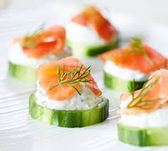 If you have small kids coming to a party, prepare a dedicated table for them with party nibbles, so they can reach their food easily (and obviously avoid hazards such as toothpicks. Smoked Salmon Cucumber Canapes Party Food Nibbles Canapes Recipes Dinner Party Nibbles