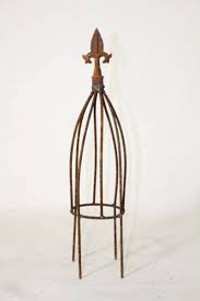 This year, i was looking for a different way to cage tomatoes. 15 Tall Twist Topiary Small Obelisk Trellis