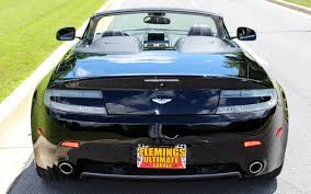 Image result for Jet Black 2010 Aston Martin