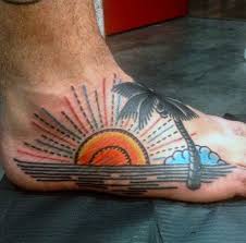 Because we all experience nature in our lives, a sunset tattoo is appealing to men of all backgrounds and demographics. Simple Homemade Like Ocean Sunset With Palm Tree On Foot Tattooimages Biz