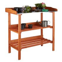 Wood finish of this garden potting table complements virtually any outdoor decor. Potting Benches You Ll Love Wayfair Co Uk