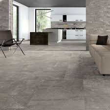The grey throws and grey cushions in add texture too. Mexicana Grey Natural Tile Living Room Tiles Grey Floor Tiles Living Room Grey Flooring Living Room