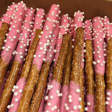 Chocolate Dipped Pretzel Sticks For Baby Shower It S A Girl Chocolate Dipped Pretzels Fairy Garden Party 1st Birthday