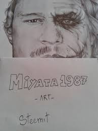 I drew Heath Ledger's portrait half Joker.