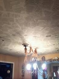 History Book Pages On Dining Room Ceiling Be Careful It Get Slippery Papering The Ceiling Dining Room Ceiling Ceiling Book Crafts