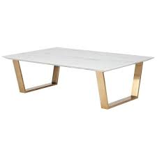 Provides an exquisite centerpiece for your new sophisticated modern living room. Nuevo Versailles Gold Coffee Table