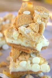 Golden Oreo White Chocolate Cheesecake Bars This Silly Girl S Kitchen Recipe Chocolate Cheesecake Bars Oreo Recipes White Chocolate Cheesecake Bars
