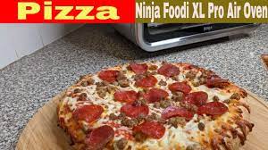 How long to cook a frozen pizza in a ninja foodie air fryer. Frozen Pizza Ninja Foodi Xl Pro Air Oven Heating Youtube