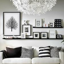 Back view picture of a group of friends jumping. 25 Cool Wall Decor Ideas With Photo Gallery For The Living Room In Your Home Wall Decor Living Room Stylish Wall Decor Living Room Wall