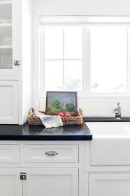 Has been added to your cart. White Kitchen Cabinets With Black Countertops Are The Next Big Reno Trend