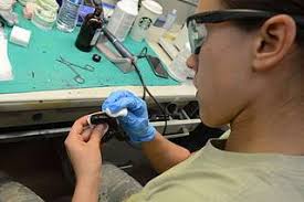 Staff Sgt. Katlyn Dumancas, 673rd Dental Squadron laboratory