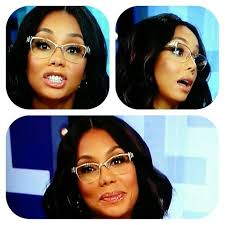 I love her GLASSES, want them. (Tamar Braxton)