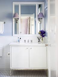 It is a perfect choice if you are trying to achieve that elusive balance between a soothing yet refined bathroom that will melt away all your woes after a long, hard day. White And Blue Bathroom With Purple Accents Transitional Bathroom