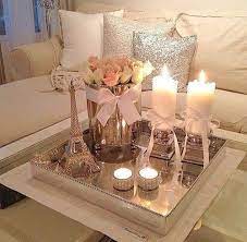 It's using these 5 easy tips and add a bit of ambiance to a coffee table by using candles in a vignette. Comfy Furnishings Pink Candles Feminine Touch Decor Decorating Coffee Tables Living Room Coffee Table